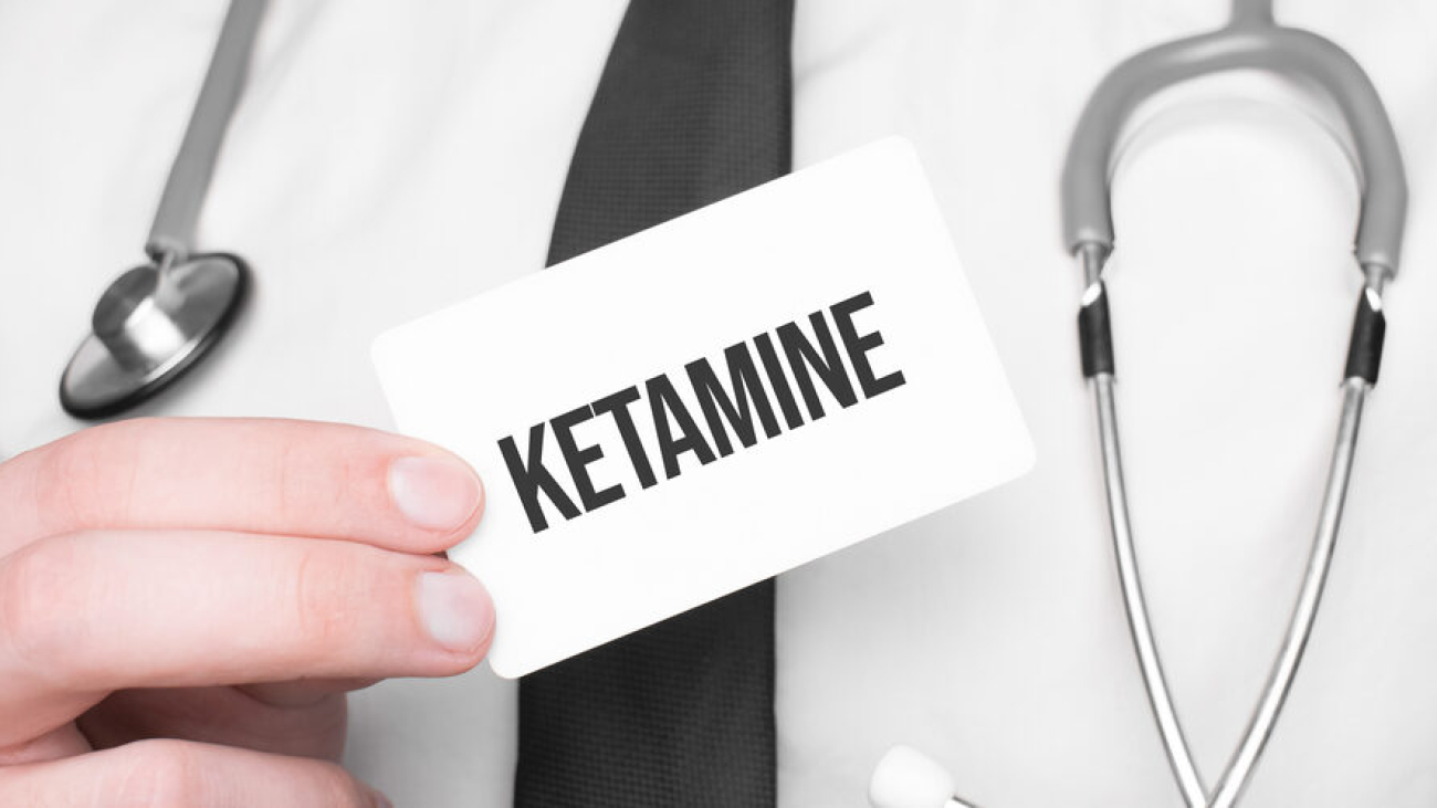 Doctor holding a card with text ketamine,medical concept