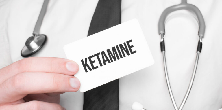 Doctor holding a card with text ketamine,medical concept